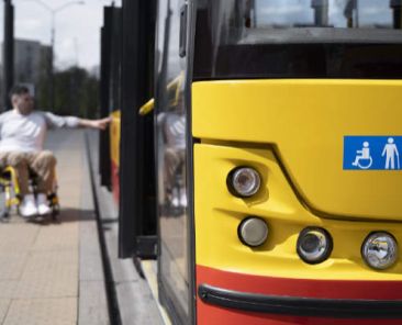 full-shot-disabled-man-near-bus_small