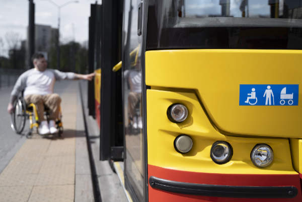 full-shot-disabled-man-near-bus_small